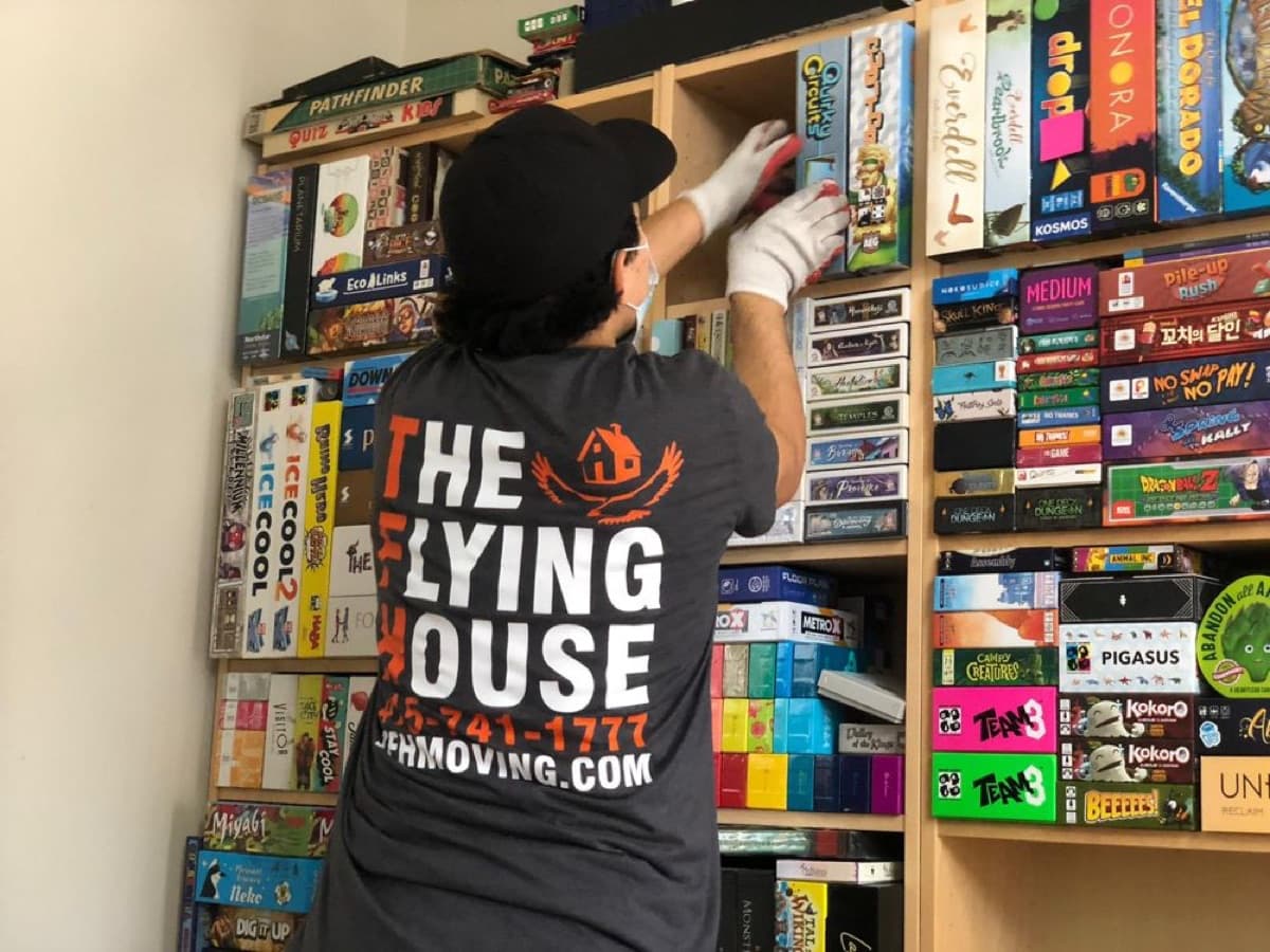 TFH mover handling a board game collection